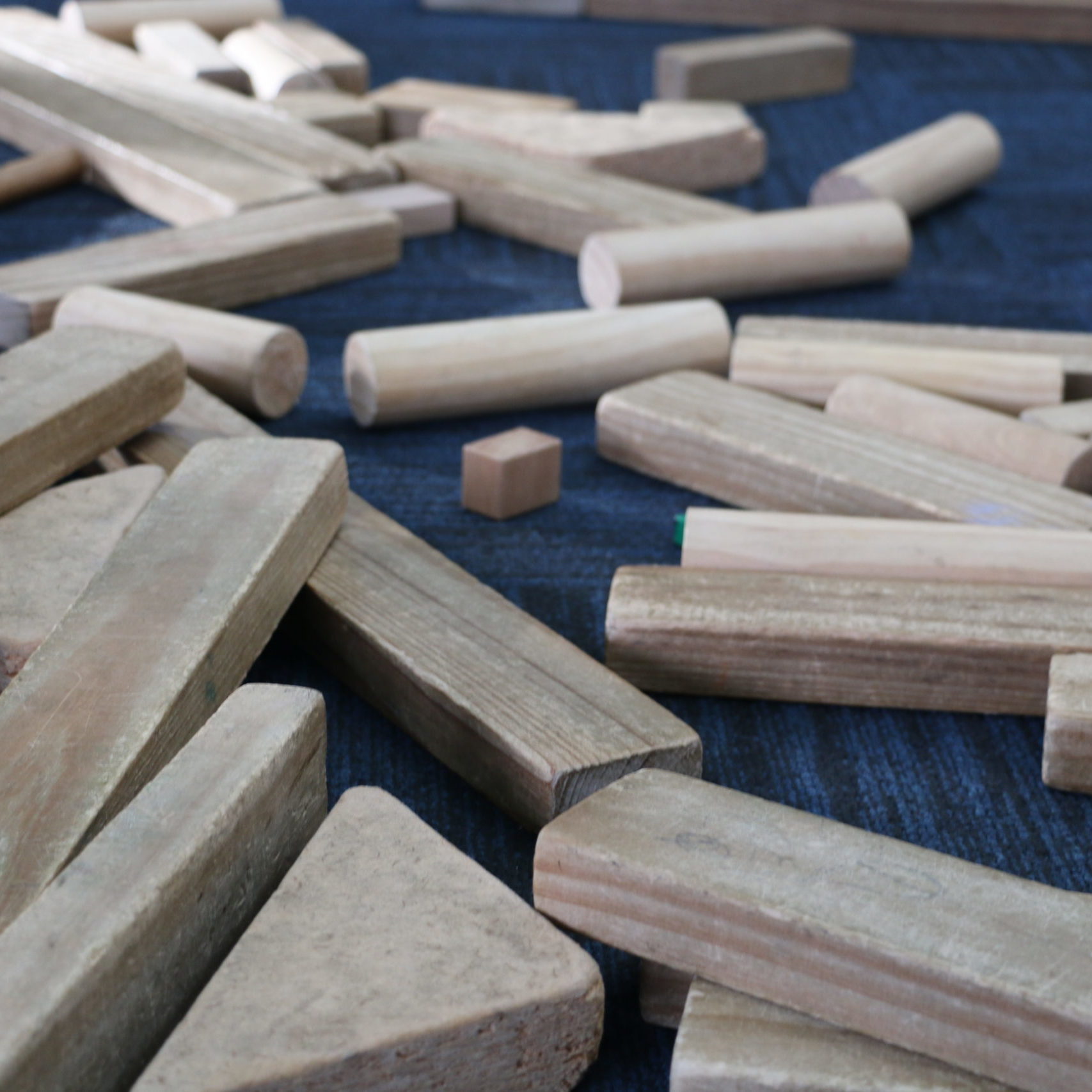 wooden blocks scattered on floor