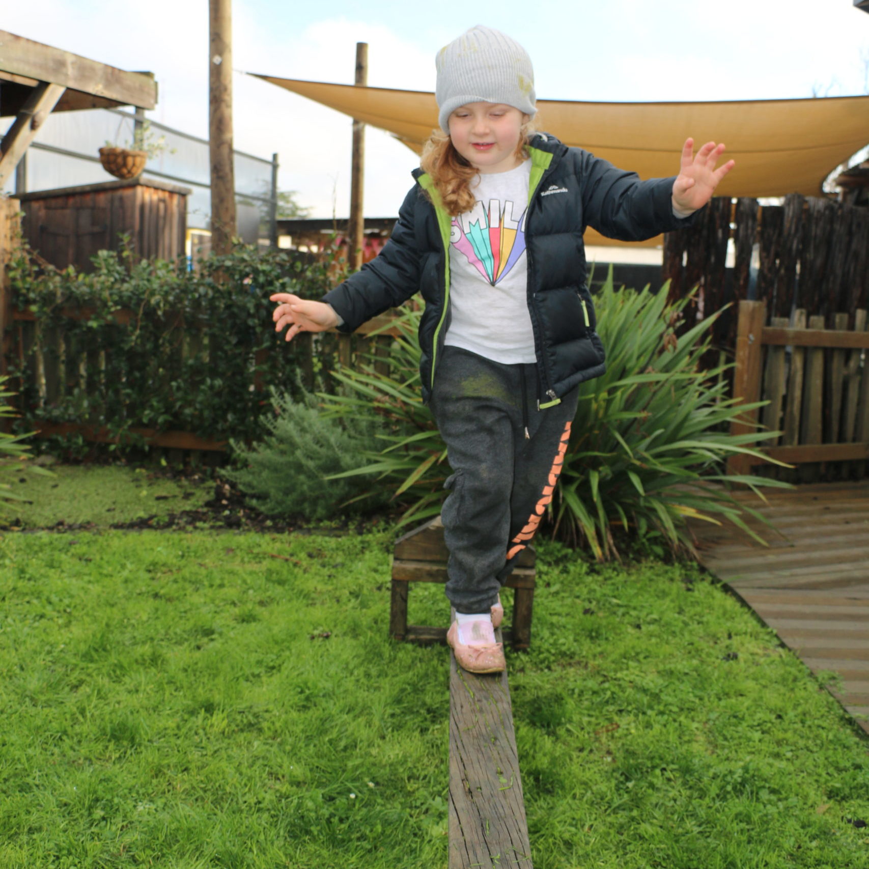 Child on a balancing beam